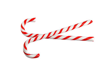 Candy canes on white background, top view. Traditional Christmas treat