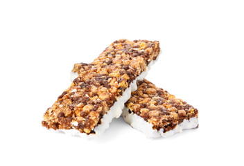Tasty granola bars on white background. Healthy snack