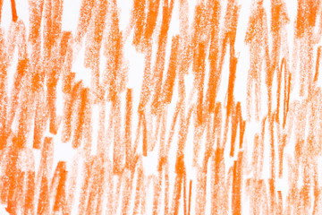 Orange pencil hatching as background, top view