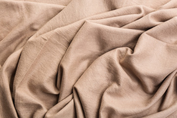 Light brown cloth as background, closeup view