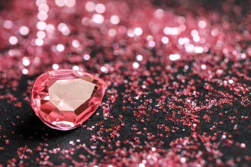  Beautiful gemstone and glitter on dark background, closeup. Space for text © New Africa