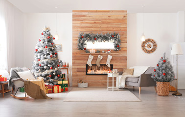 Beautiful Christmas interior of living room with decorated tree