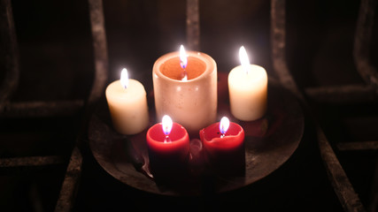 Fototapeta na wymiar Candles in Fireplace
