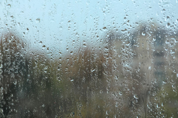 Rain drops on window glass as background, closeup