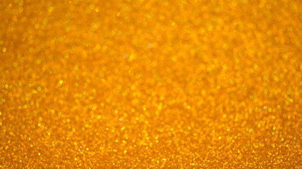 Obraz premium Blurred gold glitter background use for christmas and happy new year 2020
