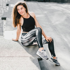 Beautiful sport fitness girl in sportswear doing fitness exercise in the street ,outdoor sports....