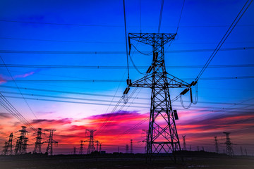 Fototapeta premium Contour of Transmission Tower at Sunset