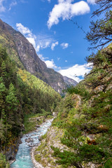 Fototapeta na wymiar Suspention bridge on the Everest Base Camp Trek, Himalaya mountains, Sagarmatha National Park, Nepal.