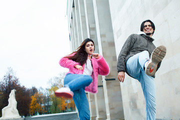 young happy students teenagers at university building on stairs, lifestyle people concept boy and girl