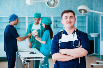 Portrait of a successful professional doctor. The staff of the medical faculty. multinational...