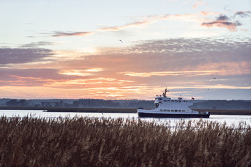 Sun setting over the Baltic sea during the late Autumn and early Spring season. 