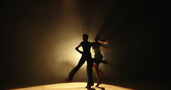 Two little asian ballroom dancers performing some latin dance. Young talented choreographers showing art - childhood dream, childhood memories concept 4k footage