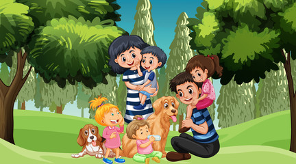 Obraz na płótnie Canvas Family with pets in the park