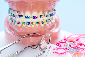 Close up dentist tools and orthodontic model  - demonstration teeth model of varities of...