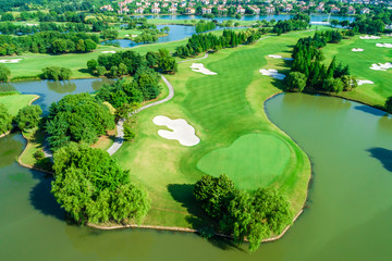 Aerial view of golf course and water