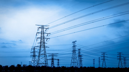 Electricity tower silhouette and sky landscape at dusk