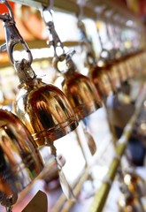 Close up of a golden bell.