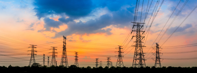 Electricity tower silhouette and sky landscape at dusk