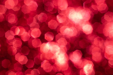 Red glitter festive background with bokeh lights. Celebration concept for Holidays and anniversary.