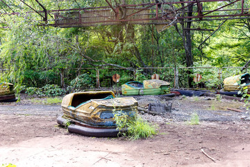 broken children's cars. Abandoned children's park. Unhappy childhood.