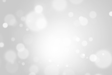 Bokeh abstract blurred gray and white beautiful background. Soft color light glitter sparkles. element for backdrop or design cosmetic ads, winter, christmas, luxury, beauty, baby, modern, creative