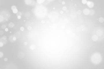 Fototapeta na wymiar Bokeh abstract blurred gray and white beautiful background. Soft color light glitter sparkles. element for backdrop or design cosmetic ads, winter, christmas, luxury, beauty, baby, modern, creative