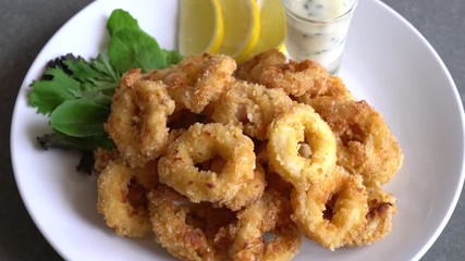 calamari (fried squid) on white plate