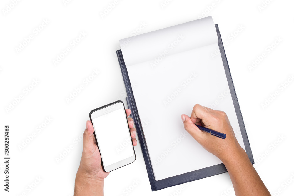 Poster top view of hands is holding the mobile phone that empty screen while writing on blank paper attache