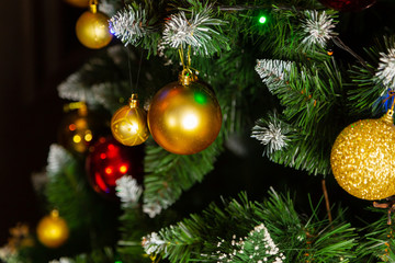 Obraz na płótnie Canvas Beautiful green christmas tree with decorations. New Year 2020.
