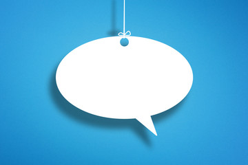 White blank speech bubble on blue background