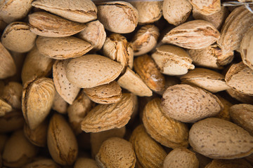 Almonds background texture. Healthy organic food concept. Top view