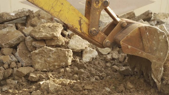 Demolishing work by JCB