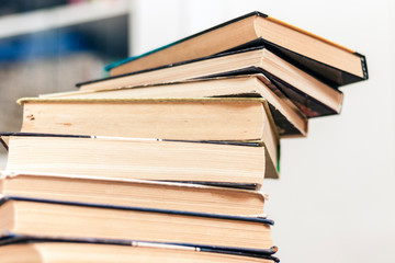 Stack of old book education concept background, many books piles with copy space for text.