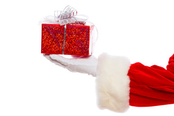 Photo of Santa Claus gloved hands holding red giftbox, isolated on white background Christmas