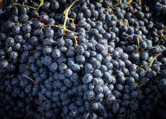 Natural-looking fruits in a street market - grapes.
