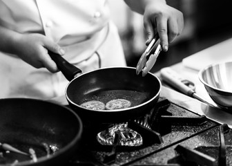 Chef cooking, Chef preparing food in the kitchen Black & White.