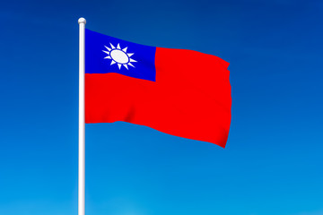 Waving flag of Taiwan on the blue sky background