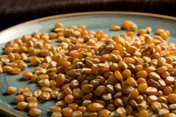 close photo Popcorn seeds on plate