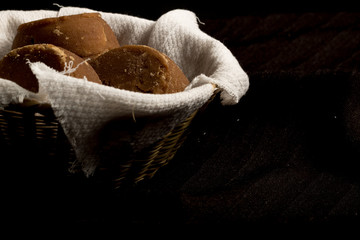 Colombian panela on basket and dark background