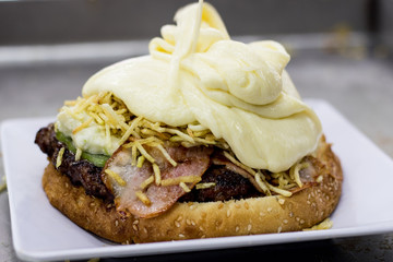 bacon burger, chopped potato and cheese