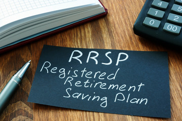 Text sign showing hand written words RRSP Registered retirement savings plan
