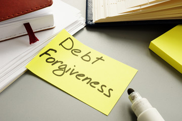 Business photo shows hand written text debt forgiveness - obrazy, fototapety, plakaty