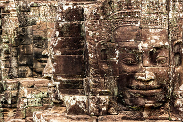 Bayon temple with smiling Buddha close up in the complex of Angkor Thom, Siem Reap, Cambodia