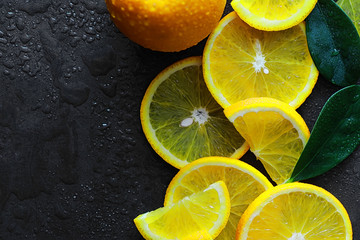 Fototapeta na wymiar Orange citrus fruit on a stone table. Orange background.