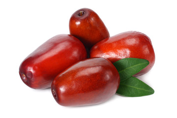 fresh date fruit with leaves isolated on white background.