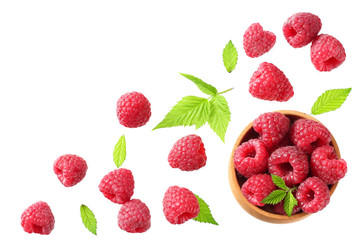 ripe raspberries with green leaf isolated on white background. top view