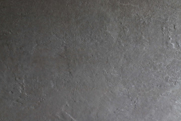 Dark grey black slate background or texture. Surface stone wall