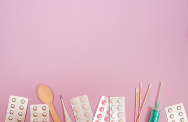 Various medicines, thermometer and syringe