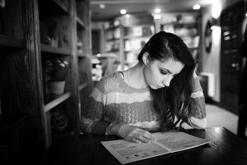 Girl in a cafe at a dinner