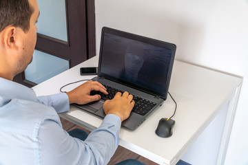 Hacker creating an artificial intelligence software program